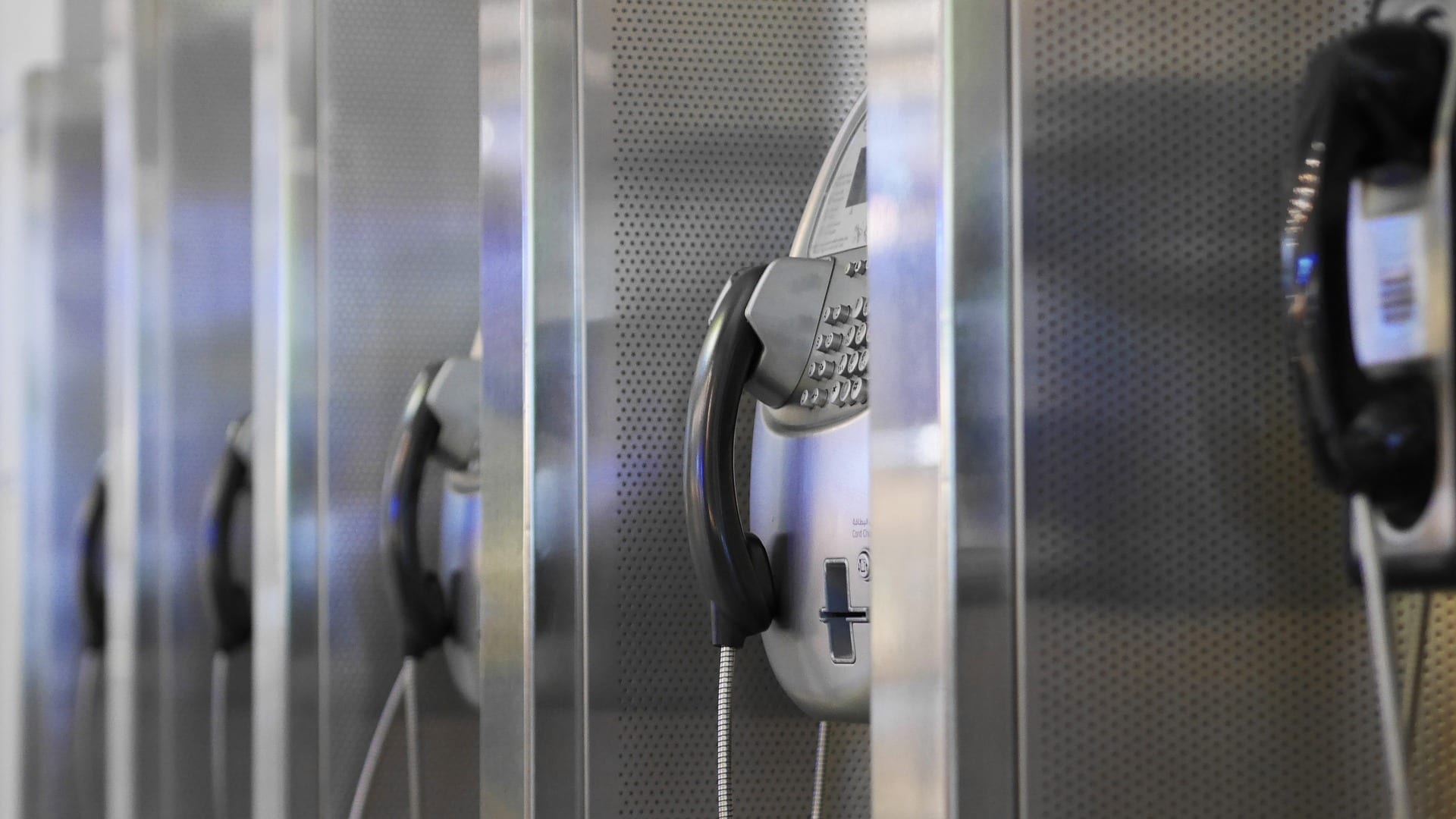 a photo of a selection of pay phones