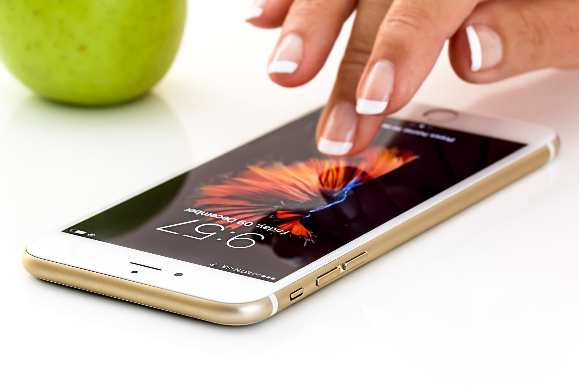 image of a hand tapping a iphone screen